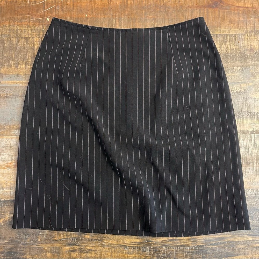 Black bodycon mini skirt with pink stripes